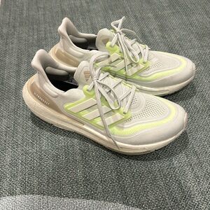Adidas Ultraboost Size 9, worn less than 20 times. Light wear. White/neon